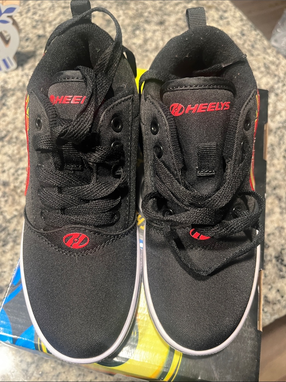 Kids Heelys Black Skate Shoes with Red Logo Accents